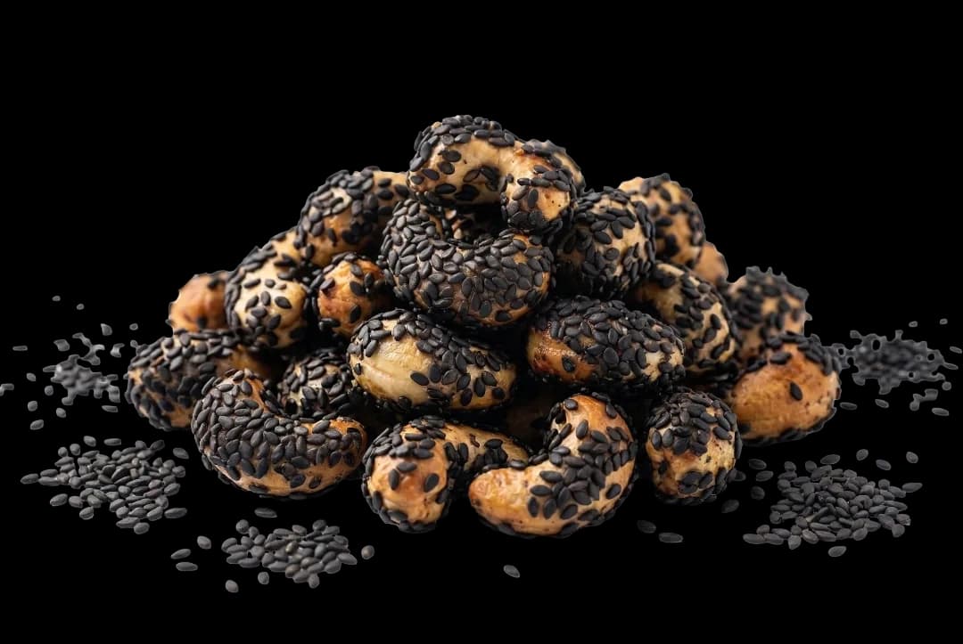 Black sesame cashews on a white background