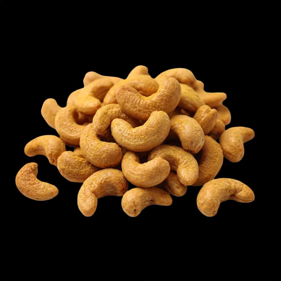 Curry powder cashews on a white background