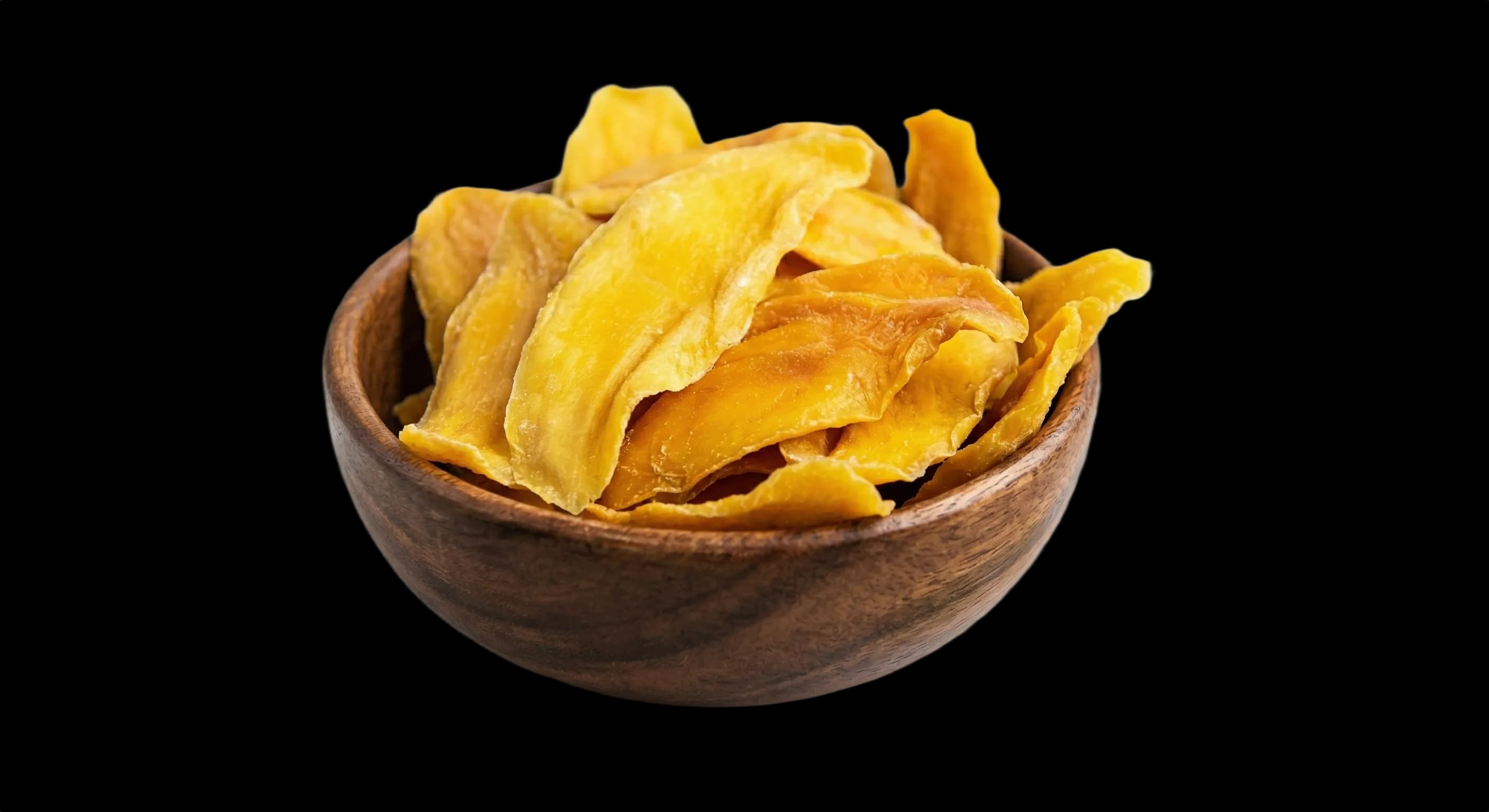 Dried mango slices on a white background