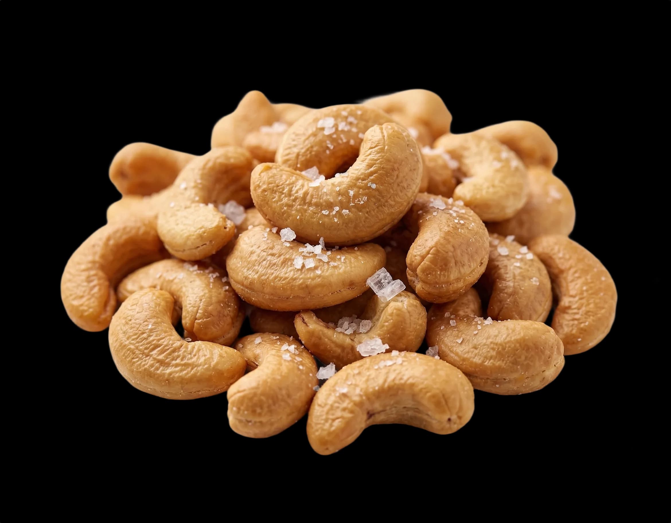 Sea salted cashews on a white background